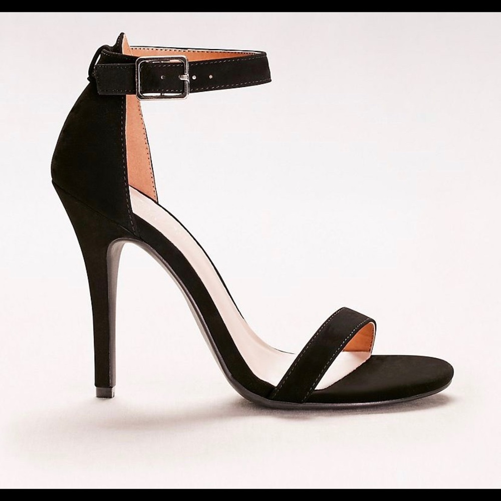 A pair of simple ankle strap sandals